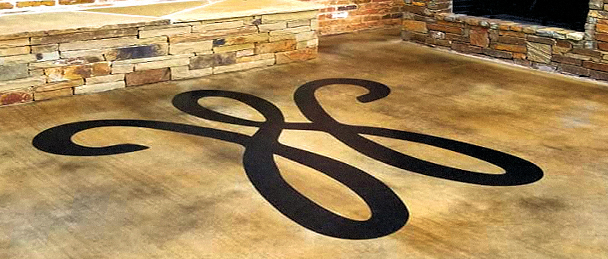 Monogrammed concrete floor